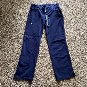 Navy blue FIGS scrub pants